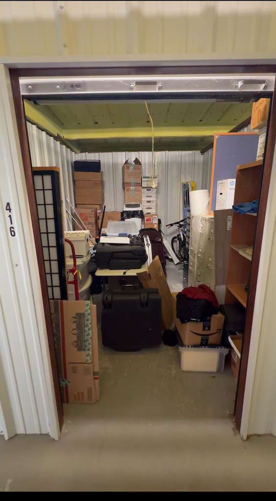 Before — cluttered storage unit